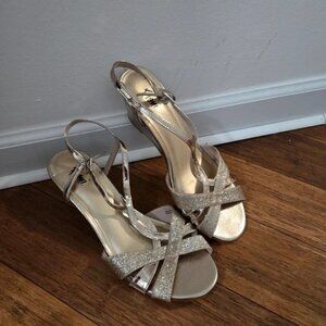 Golden strappy heels